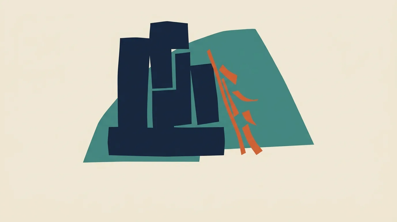 Dark geometric towers beside an orange ladder.